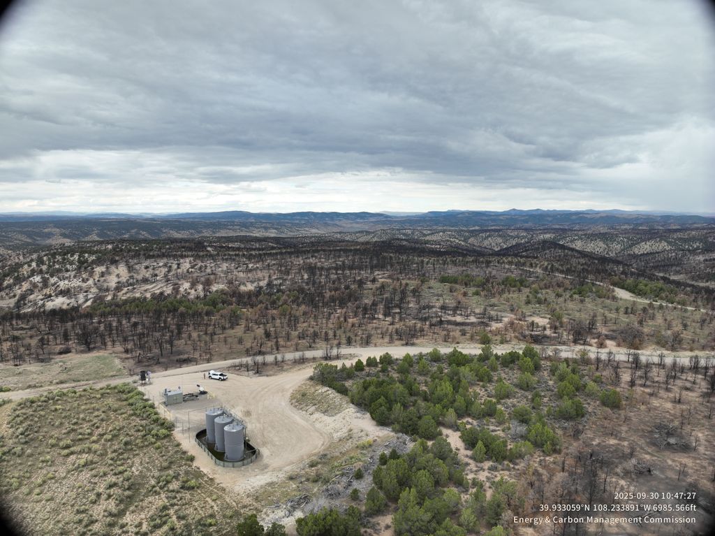 The Lee Fire burn area. Taken from above by drone, the foliage has been removed from an oil and gas site to protect it from fire.