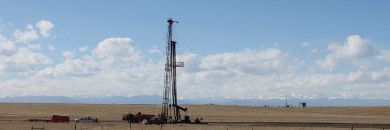 Oil Derrick in Field